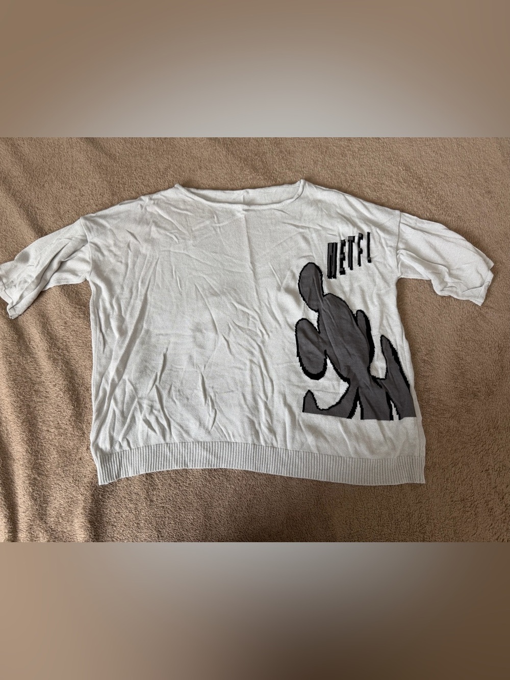 Graphic Knit Top with Black/Grey Abstract Design